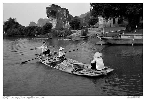 Villagers transport stones from the quary on Ken Ga canal. Ninh Binh,  Vietnam (black and white)