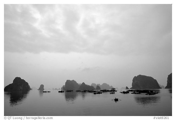Distant view of the bay with its three thousands limestone islets. Halong Bay, Vietnam (black and white)