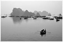 Fishing boat fleet. Halong Bay, Vietnam (black and white)