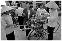 Buying live birds. Sapa, Vietnam ( black and white)