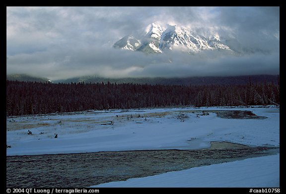 River, snow, and peak emerging from clouds. Banff National Park, Canadian Rockies, Alberta, Canada (color)