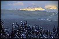 Snowy peaks hit by a ray of sun after a winter storm. Banff National Park, Canadian Rockies, Alberta, Canada