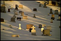 Tombs with crosses in snow. Calgary, Alberta, Canada