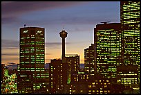 Tower and high-rise buildings, at dusk. Calgary, Alberta, Canada