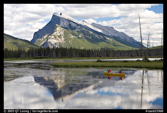 Canoe and Mt Rundle reflection in first Vermillion Lake, afternon. Banff National Park, Canadian Rockies, Alberta, Canada