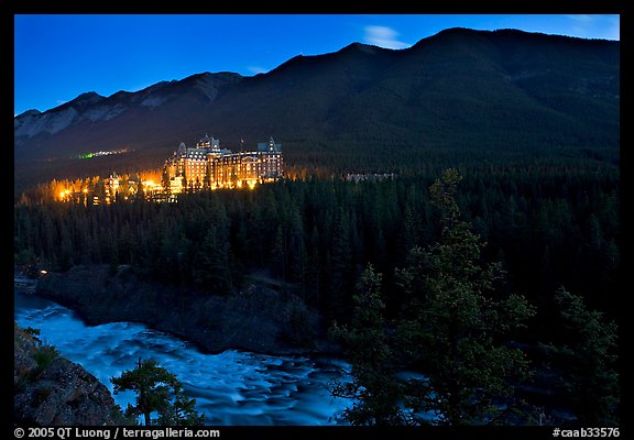 Banff Springs Hotel, Bow River and Falls at night. Banff National Park, Canadian Rockies, Alberta, Canada (color)