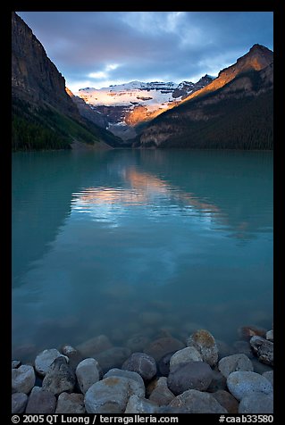 Boulders, Lake Louise, and Victoria Peak, sunrise. Banff National Park, Canadian Rockies, Alberta, Canada (color)