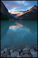 Boulders, Lake Louise, and Victoria Peak, sunrise. Banff National Park, Canadian Rockies, Alberta, Canada