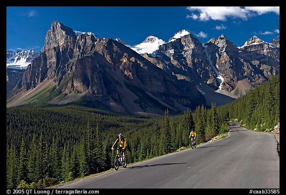 Cyclists on the road to the Valley of Ten Peaks. Banff National Park, Canadian Rockies, Alberta, Canada