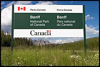 Bilingual sign at the entrance of the Park. Banff National Park, Canadian Rockies, Alberta, Canada (color)