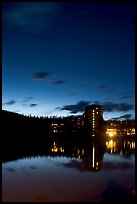 Chateau Lake Louise reflected in Lake at night. Banff National Park, Canadian Rockies, Alberta, Canada