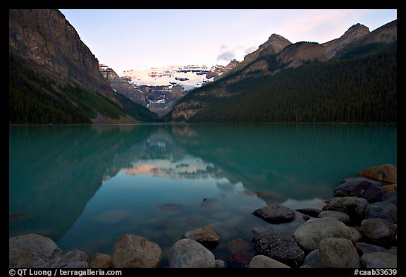 Boulders, Victoria Peak, and Lake Louise, sunrise. Banff National Park, Canadian Rockies, Alberta, Canada