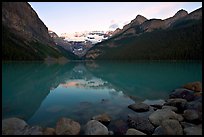 Boulders, Victoria Peak, and Lake Louise, sunrise. Banff National Park, Canadian Rockies, Alberta, Canada ( color)