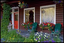 Porch of a cabin with flowers. Banff National Park, Canadian Rockies, Alberta, Canada