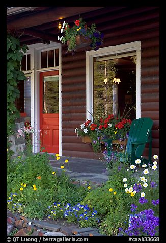 Flowered porch of a wooden cabin. Banff National Park, Canadian Rockies, Alberta, Canada