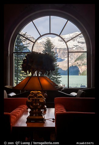 Lake Louise seen through a window of Chateau Lake Louise hotel. Banff National Park, Canadian Rockies, Alberta, Canada