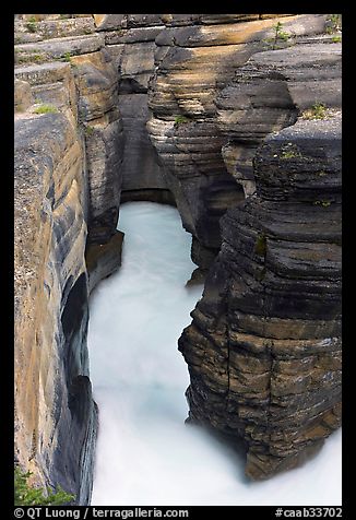 Stratified layers of rock cut by water, Mistaya Canyon. Banff National Park, Canadian Rockies, Alberta, Canada (color)