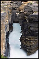 Stratified layers of rock cut by water, Mistaya Canyon. Banff National Park, Canadian Rockies, Alberta, Canada