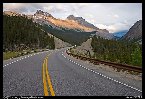 Twisting road, Icefields Parkway, sunset. Banff National Park, Canadian Rockies, Alberta, Canada (color)