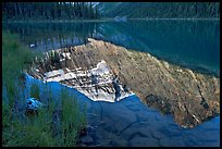 Reflections in Cavell Lake, early morning. Jasper National Park, Canadian Rockies, Alberta, Canada