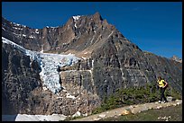 Woman hiking on trail near Mt Edith Cavell. Jasper National Park, Canadian Rockies, Alberta, Canada (color)