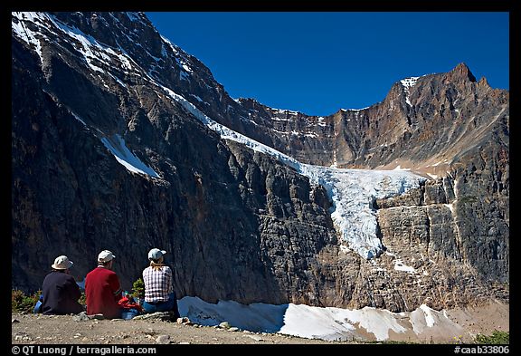 Hikers looking at Angel Glacier and Cavell Glacier. Jasper National Park, Canadian Rockies, Alberta, Canada (color)
