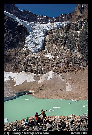 Family looking at Cavell Pond and Angel Glacier. Jasper National Park, Canadian Rockies, Alberta, Canada (color)