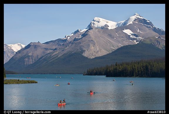 Canoes on Maligne Lake, afternoon. Jasper National Park, Canadian Rockies, Alberta, Canada (color)