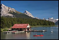 Boat house and canoe beneath Leh and Samson Peaks,  Maligne Lake. Jasper National Park, Canadian Rockies, Alberta, Canada