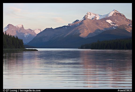 Peaks reflected in rippled water, Maligne Lake, sunset. Jasper National Park, Canadian Rockies, Alberta, Canada (color)