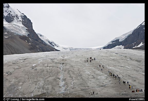 Toe of Athabasca Glacier with tourists in delimited area. Jasper National Park, Canadian Rockies, Alberta, Canada