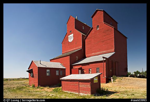 Red wooden grain elevator building. Alberta, Canada (color)