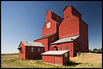 Red wooden grain elevator building. Alberta, Canada