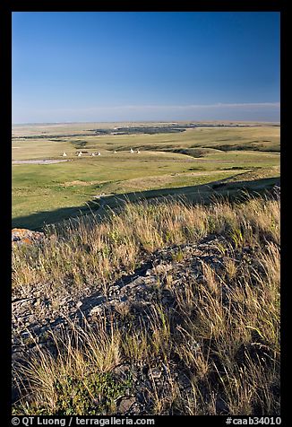 Prairie and teepees from the top of the cliff, Head-Smashed-In Buffalo Jump. Alberta, Canada (color)