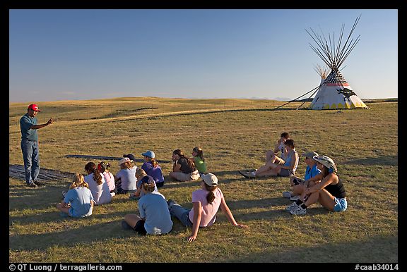 First nations man giving a lecture to students, Head-Smashed-In Buffalo Jump. Alberta, Canada (color)