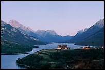 Prince of Wales hotel over Waterton Lakes, dusk. Waterton Lakes National Park, Alberta, Canada (color)