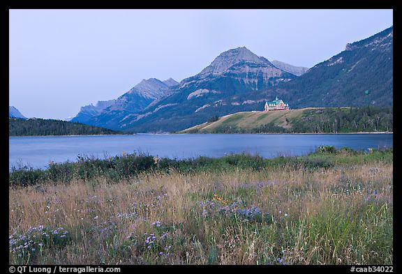 Prince of Wales hotel and upper Waterton Lake, dawn. Waterton Lakes National Park, Alberta, Canada (color)
