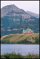 Prince of Wales hotel, lake and mountain, dawn. Waterton Lakes National Park, Alberta, Canada (color)