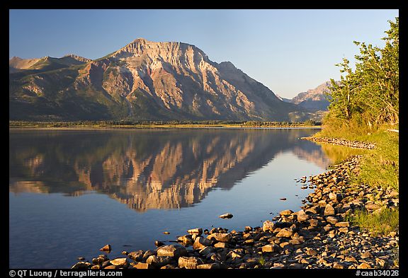 Shoreline with pebbles, Middle Waterton Lake, and Vimy Peak. Waterton Lakes National Park, Alberta, Canada (color)