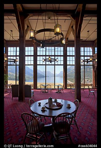 Table in lobby of Prince of Wales hotel with view over Waterton Lake. Waterton Lakes National Park, Alberta, Canada (color)