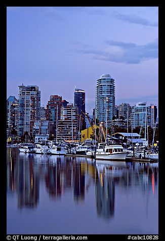 Small boat harbor and skyline at dusk. Vancouver, British Columbia, Canada (color)