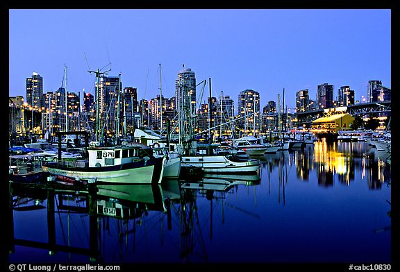 Fishing boats and skyline at night. Vancouver, British Columbia, Canada (color)