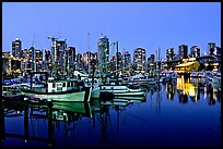 Fishing boats and skyline at night. Vancouver, British Columbia, Canada (color)