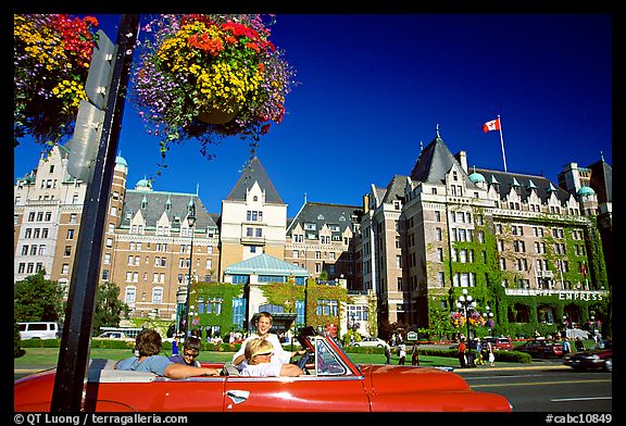 Red convertible car and Empress hotel. Victoria, British Columbia, Canada