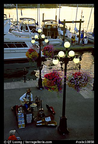 Street performers on the quay of Inner Harbor. Victoria, British Columbia, Canada (color)