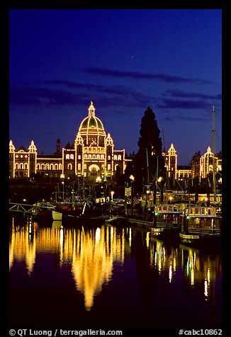 Parliament buildings lights reflected in the harbor. Victoria, British Columbia, Canada