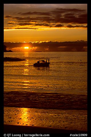 Small boat at Sunset, Half-moon bay. Pacific Rim National Park, Vancouver Island, British Columbia, Canada (color)