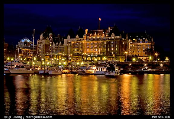Empress hotel reflected in the Inner Harbour a night. Victoria, British Columbia, Canada