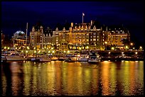 Empress hotel reflected in the Inner Harbour a night. Victoria, British Columbia, Canada (color)