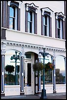 Store with reflections in windows. Victoria, British Columbia, Canada ( color)